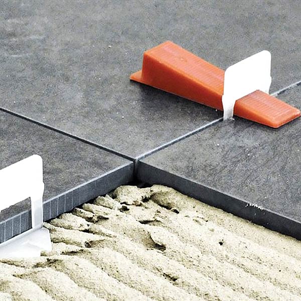 Tile leveling systems
